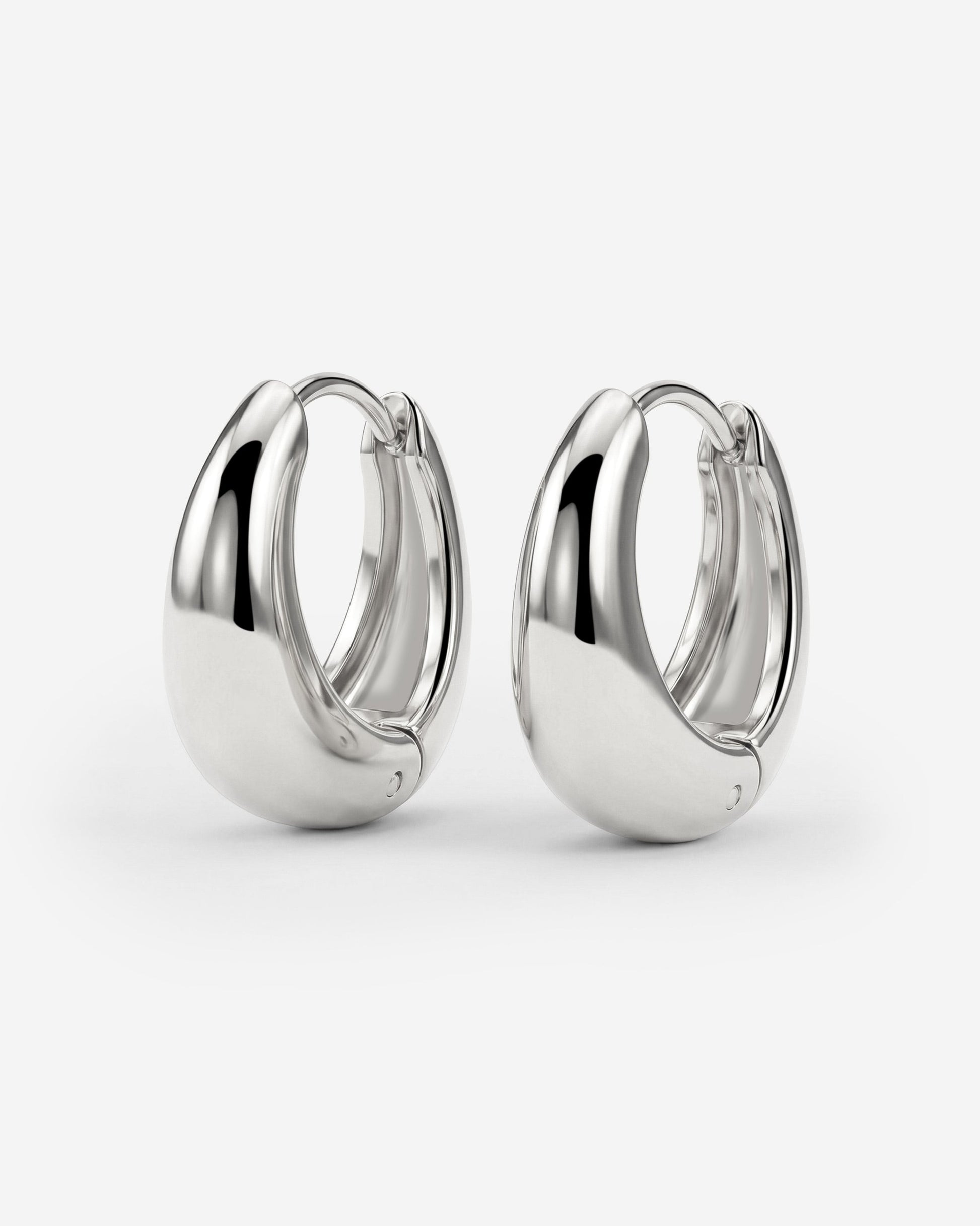 Gilded Curve Hoops Silver