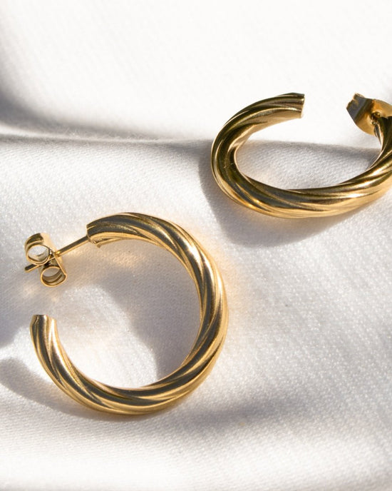 Squeeze it Medium Hoop Studs Silver